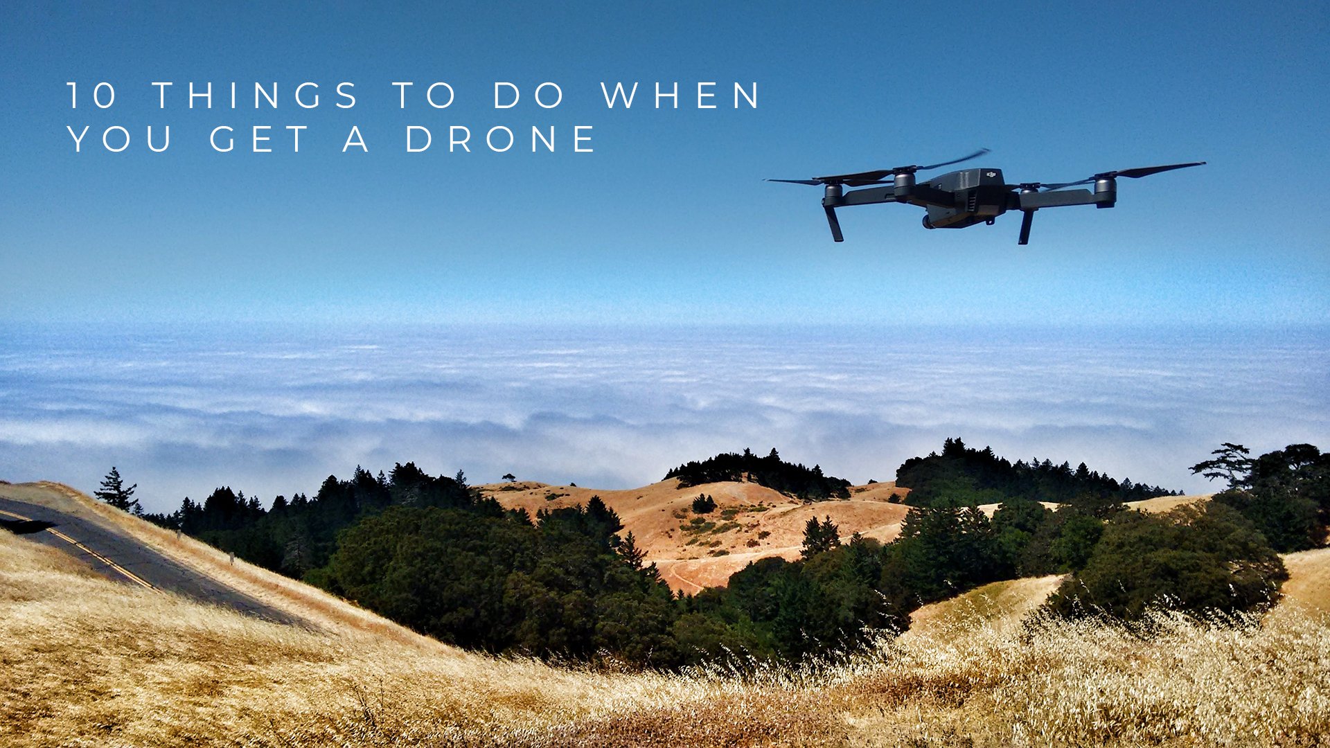 Drone flying above mountain road with wording 10 Things to do when you get a drone